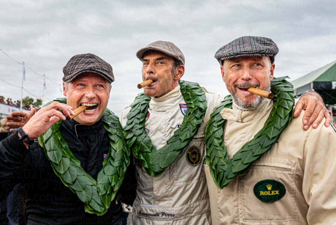 Andy Priaulx, Emanuele Pirro & Shaun Lynn celebrating with Rousto House Cigars. Photographed at Goodwood Revival 2021 by Indira Flack